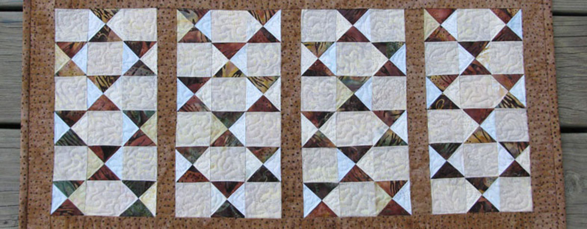 Table Runner using AccuQuilt GO! Qube Serendipity Set by Edyta Sitar