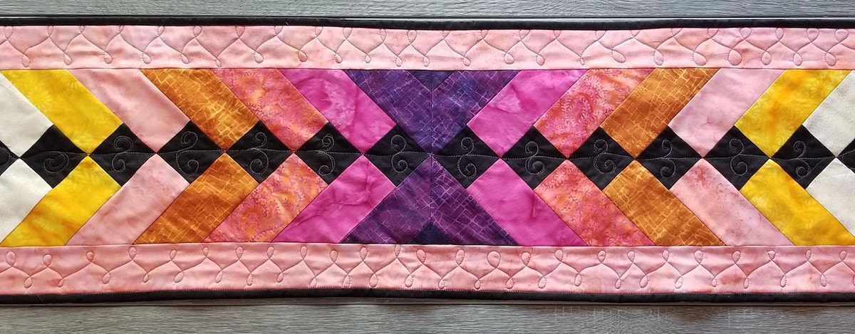 Celebrate National Sew a Jelly Roll Day with AccuQuilt!
