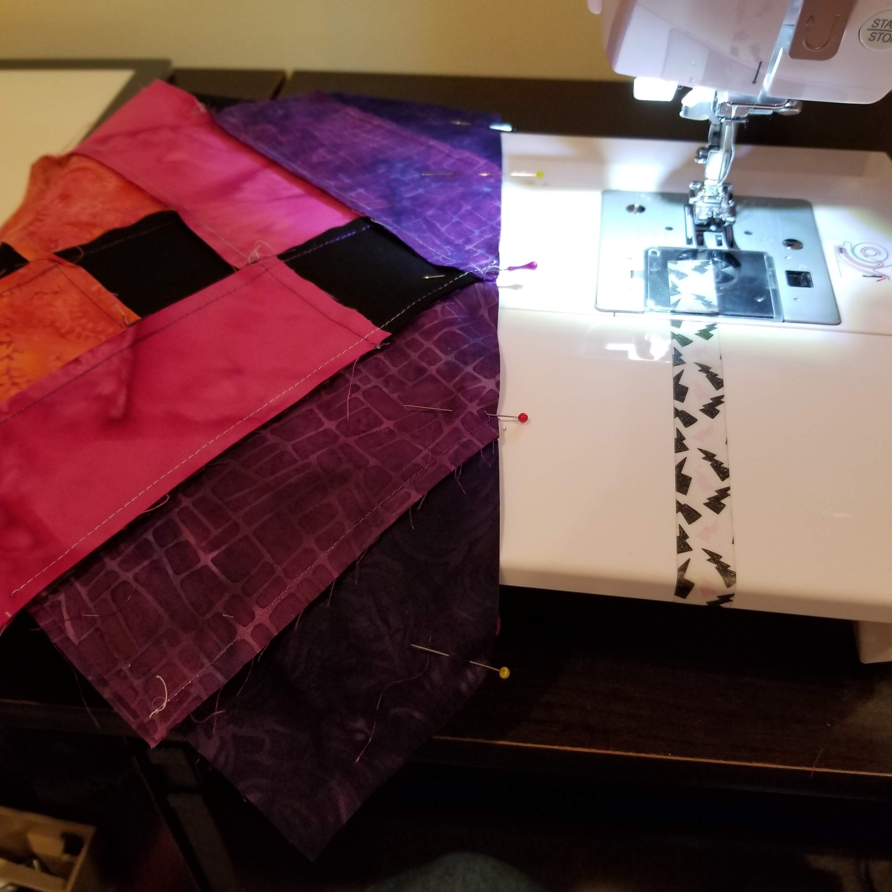 assembling quilted table runner with pins sewing