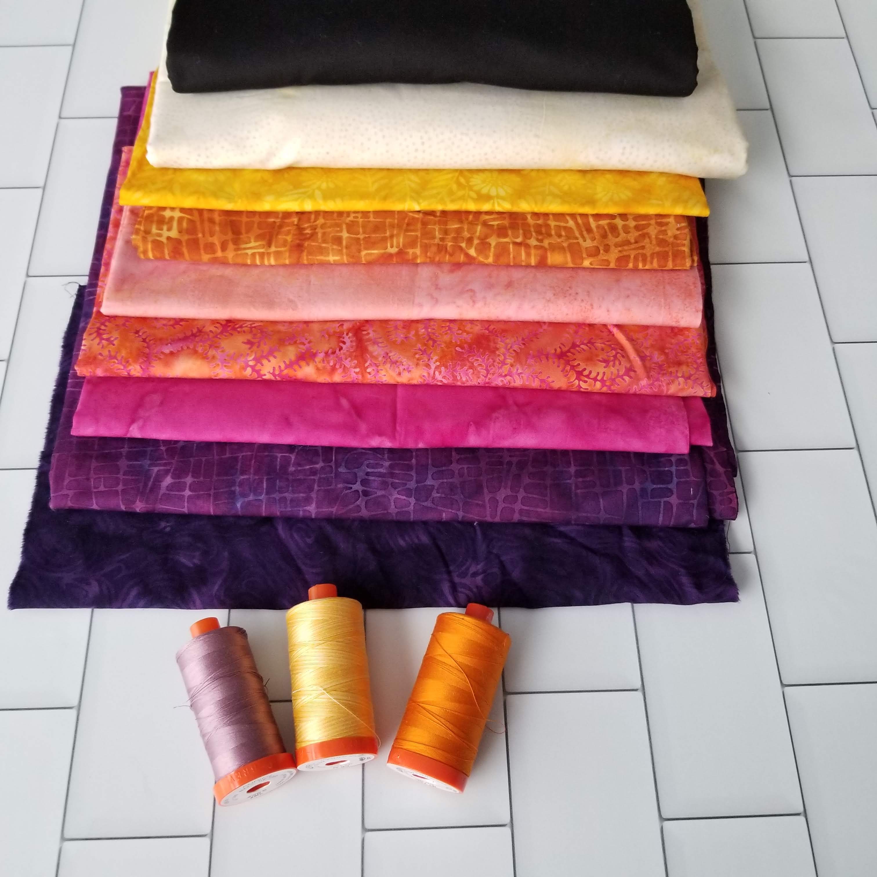 island batik fabrics in purples, pinks, oranges and yellows