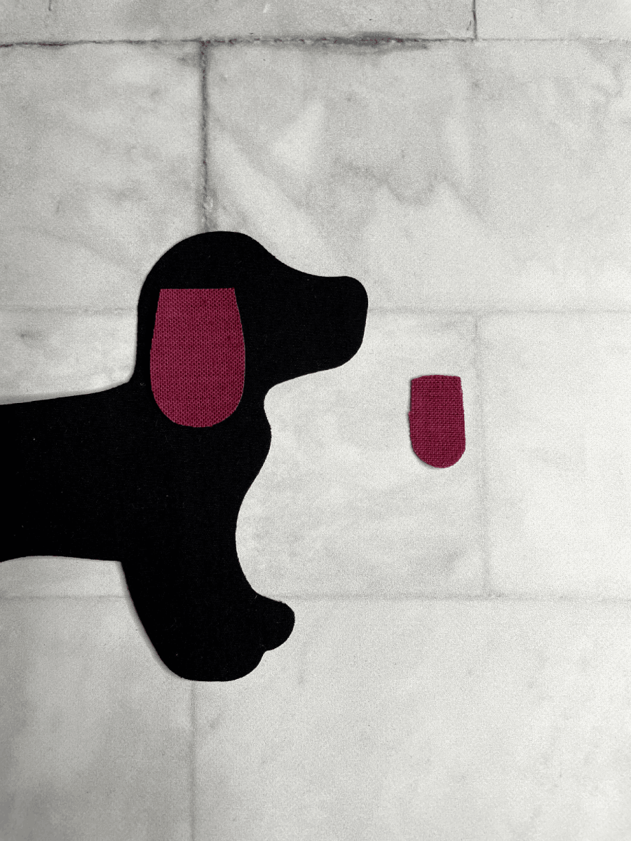 Fuse ear in place on dog applique