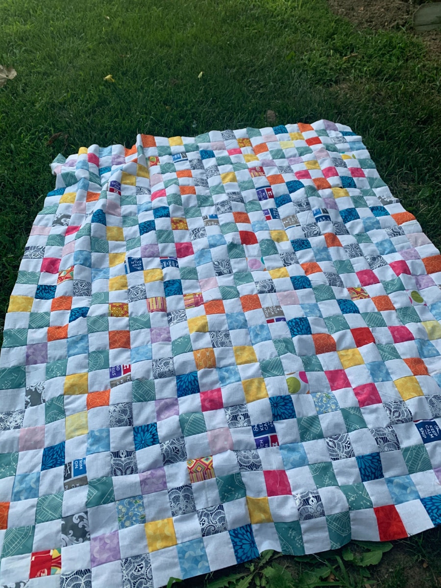 Leslie's Scrappy Square Quilt Using Subcut Squares from GO! Strip Dies