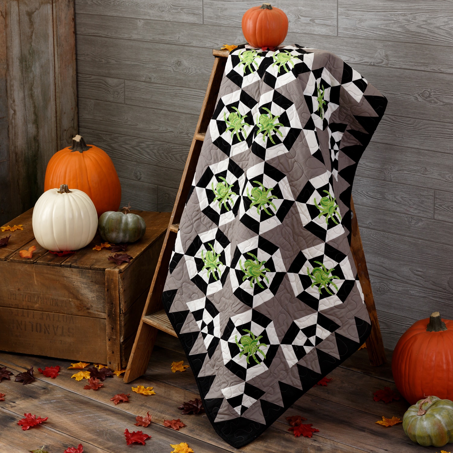 PQ11619-spinning-web-throw-quilt-lifestyle-1500x1500