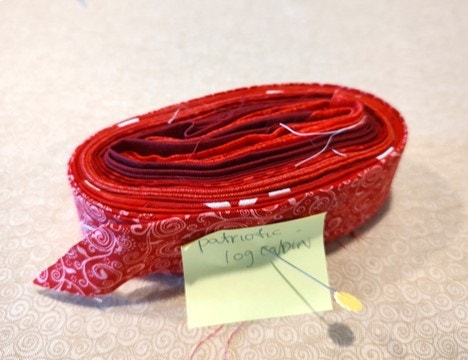 Scrappy Red Binding for the Scrappy Patriotic Log Cabin Star Quilt