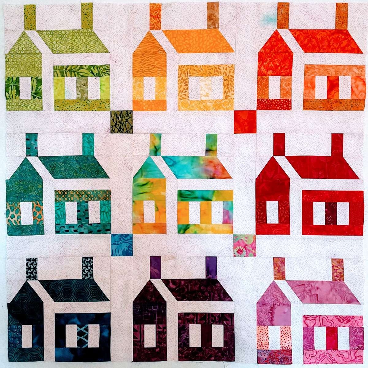 Scrappy schoolhouse quilt block sashing and cornerstones